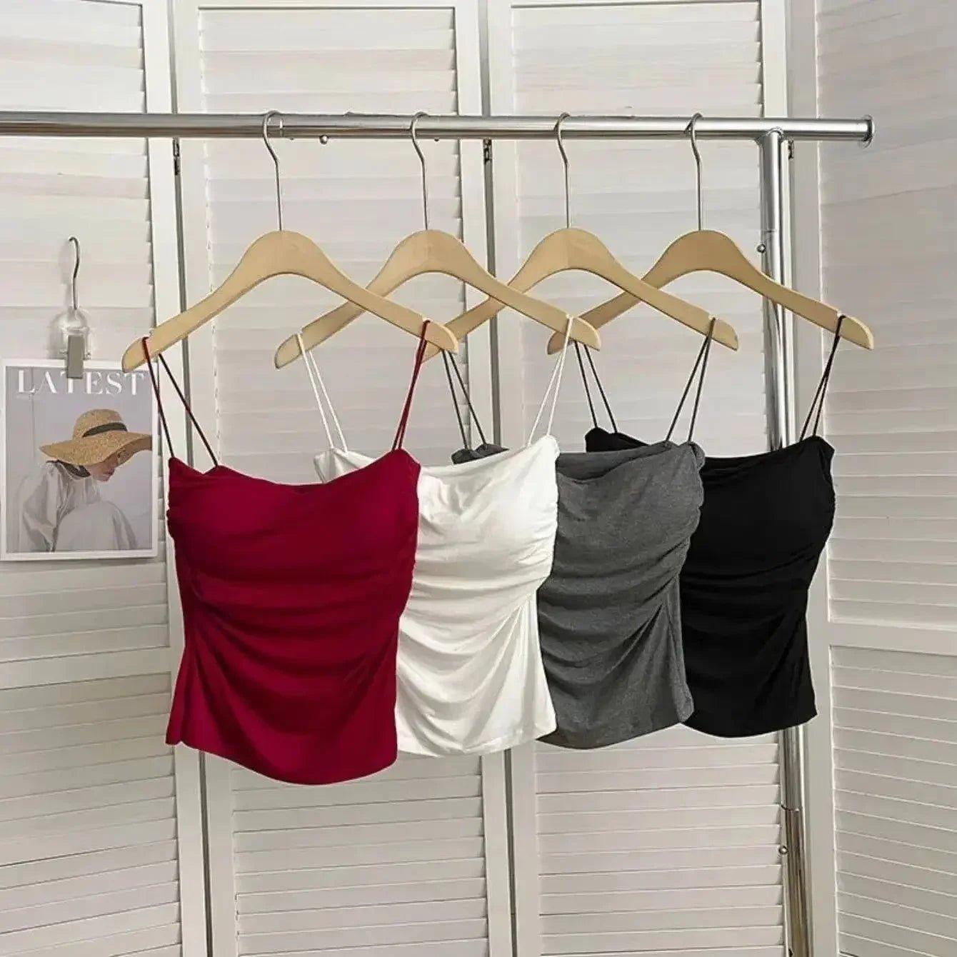 Women's fashion ruched camisoles in red, white, gray, black on hangers