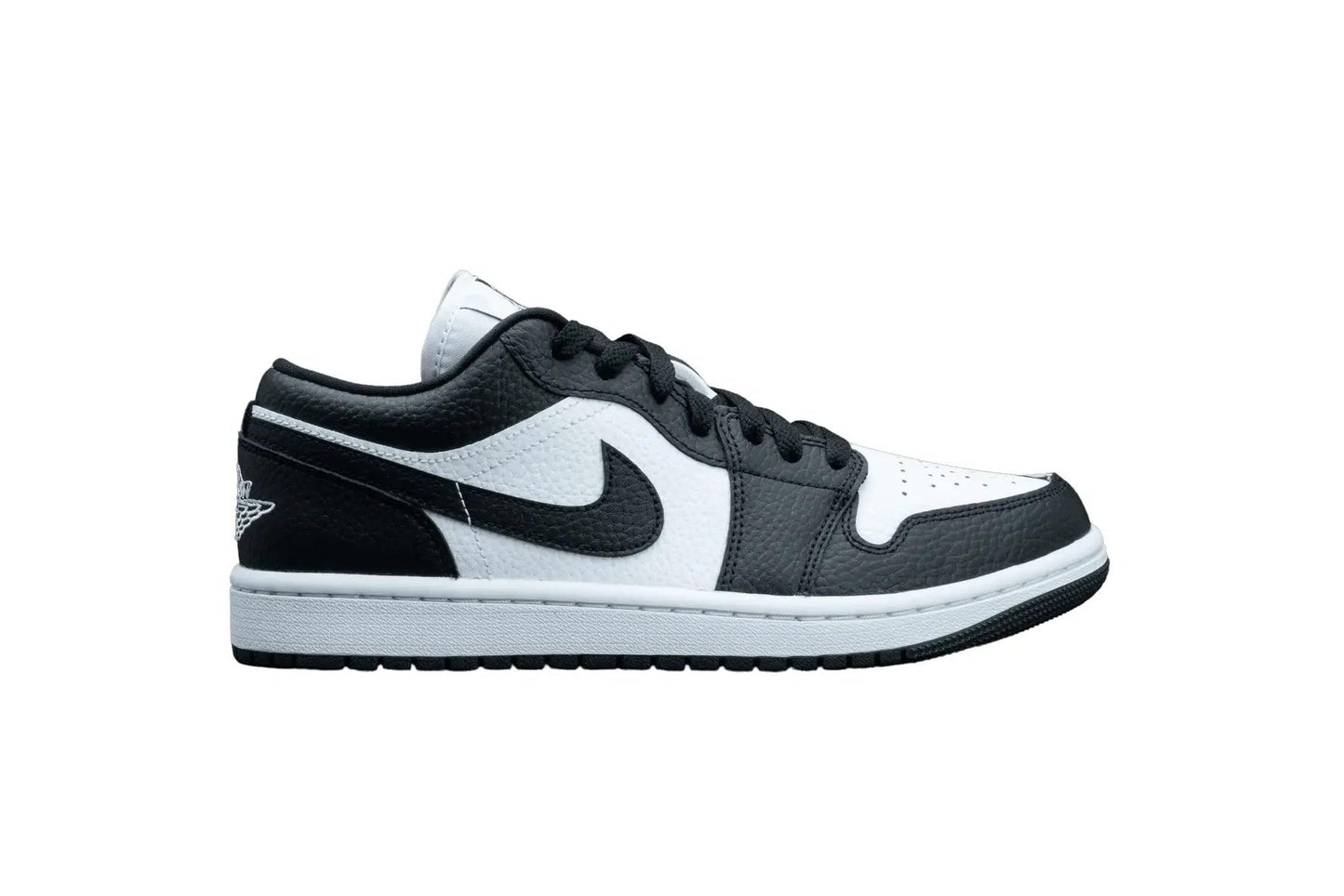 Black and white low-top sneaker with Nike swoosh, stylish women's fashion footwear