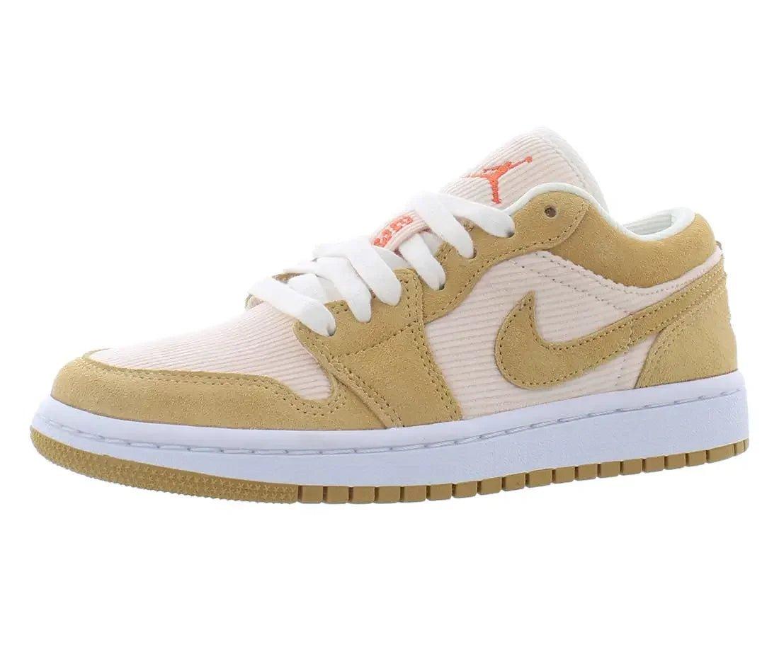Beige and white low-top sneaker with orange Jumpman logo, ideal for women's fashion and casual wear