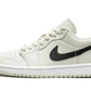 Cream and black low-top sneaker with Nike swoosh, women's fashion footwear