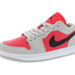 Women's pink and gray low-top sneaker with black swoosh and Jumpman logo, casual fashion footwear