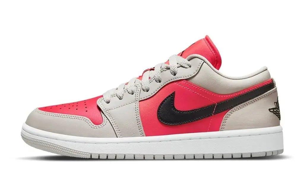 Women's pink and gray low-top sneaker with black swoosh, casual fashion footwear