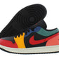 Colorful Nike Air Jordan 1 Low sneaker with black, red, yellow, blue, and green panels, white sole, and visible Nike swoosh