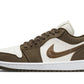 Brown and white low-top sneaker with Nike swoosh, casual fashion footwear