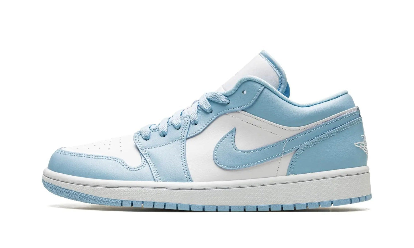 Light blue and white women's fashion sneaker with Nike swoosh, stylish low-top design for casual wear