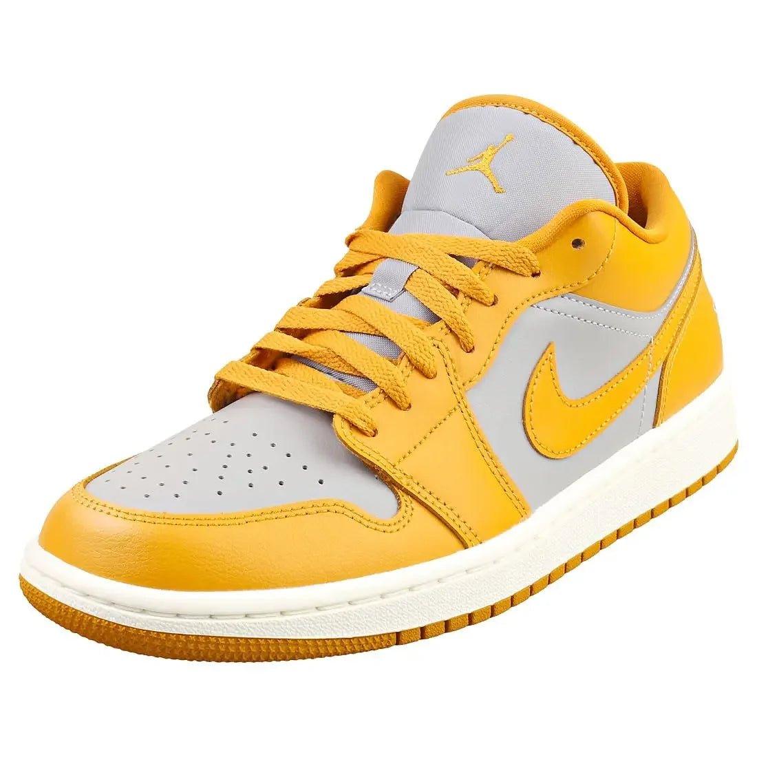 Yellow and gray Air Jordan 1 Low sneaker with Nike swoosh, women's fashion footwear