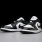 Black and white Air Jordan 1 low sneakers with Nike swoosh, stylish women's fashion footwear
