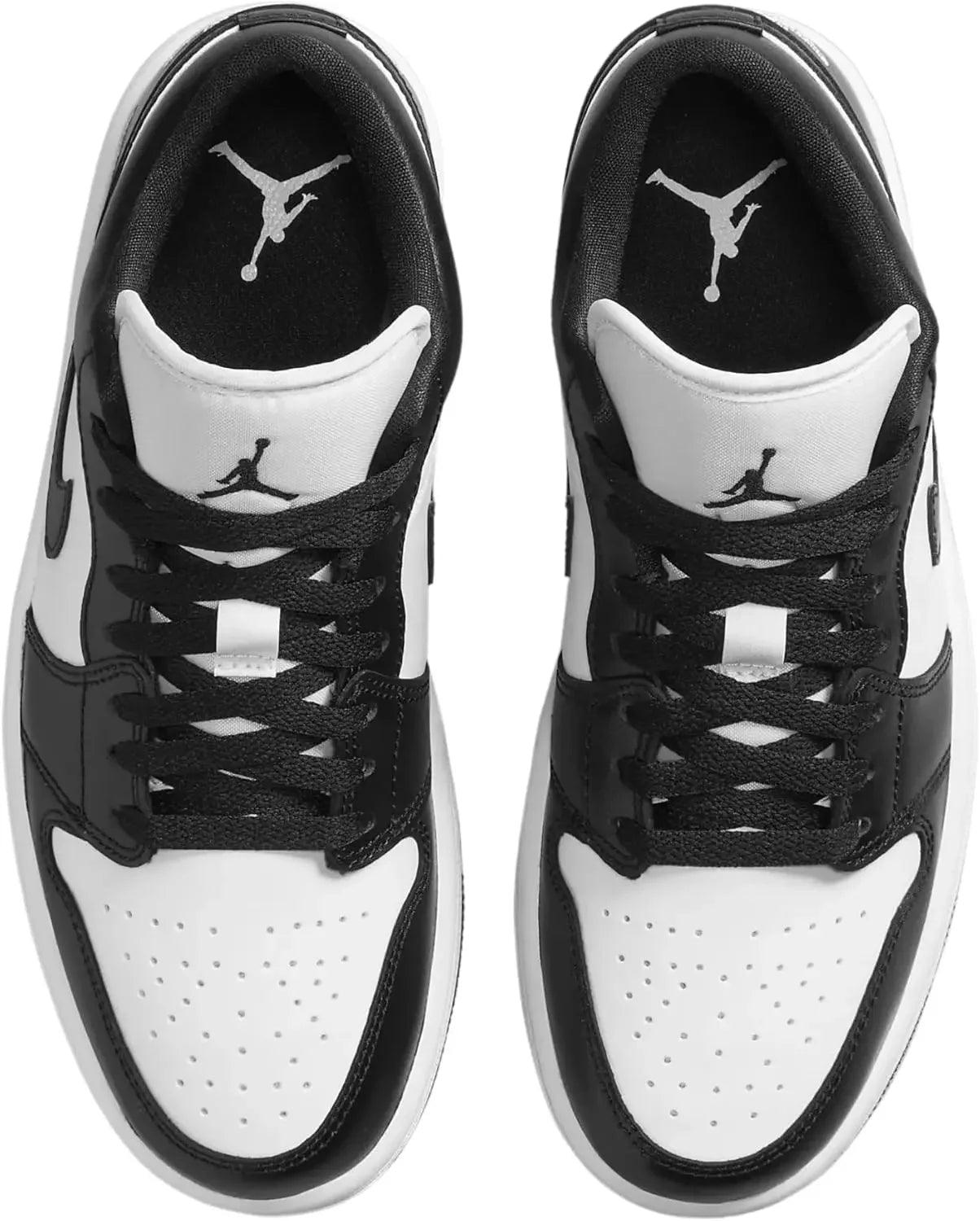 Black and white Air Jordan 1 sneakers with Jumpman logo, ideal for women's fashion and streetwear styles.