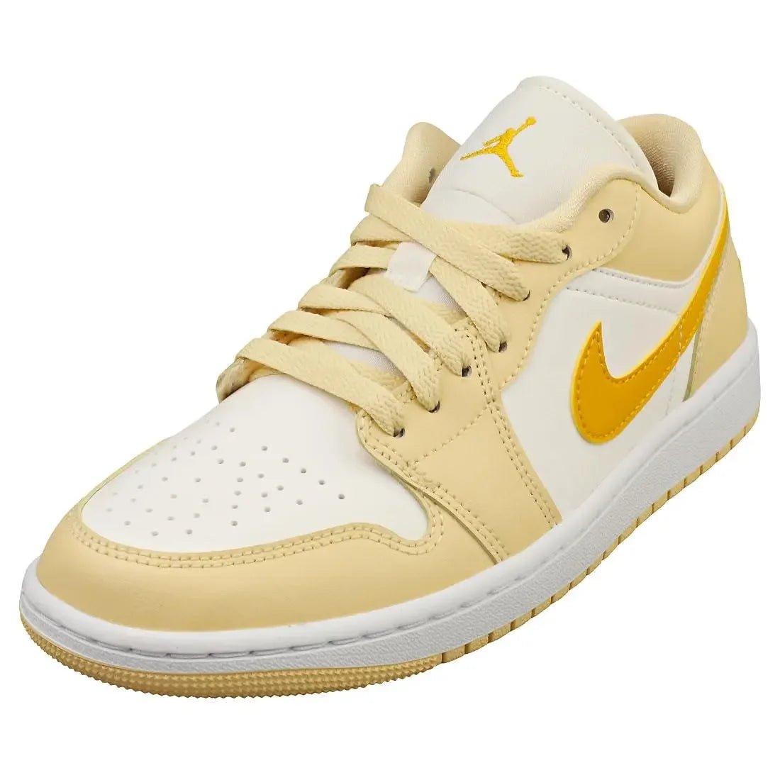 Cream and yellow women's Air Jordan 1 low sneaker with Nike swoosh, fashion footwear