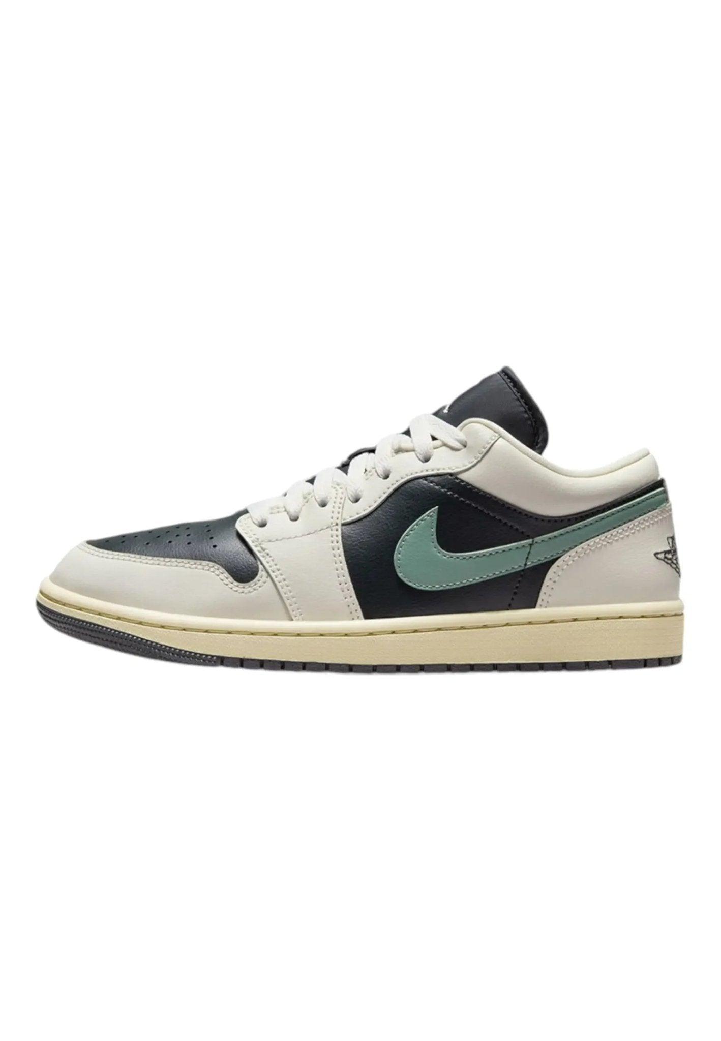 Women's low-top sneaker with black, cream, and mint green accents, perfect for casual fashion