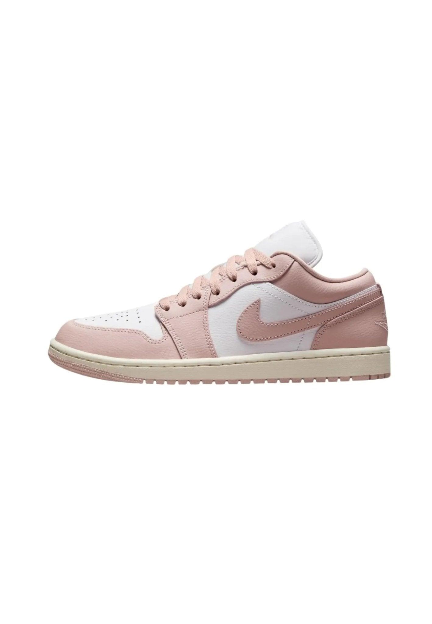 Pink and white low-top sneaker with Nike swoosh, women's fashion footwear