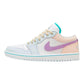 Pastel pink and purple women's low-top sneaker with white base and teal accents, ideal for casual fashion