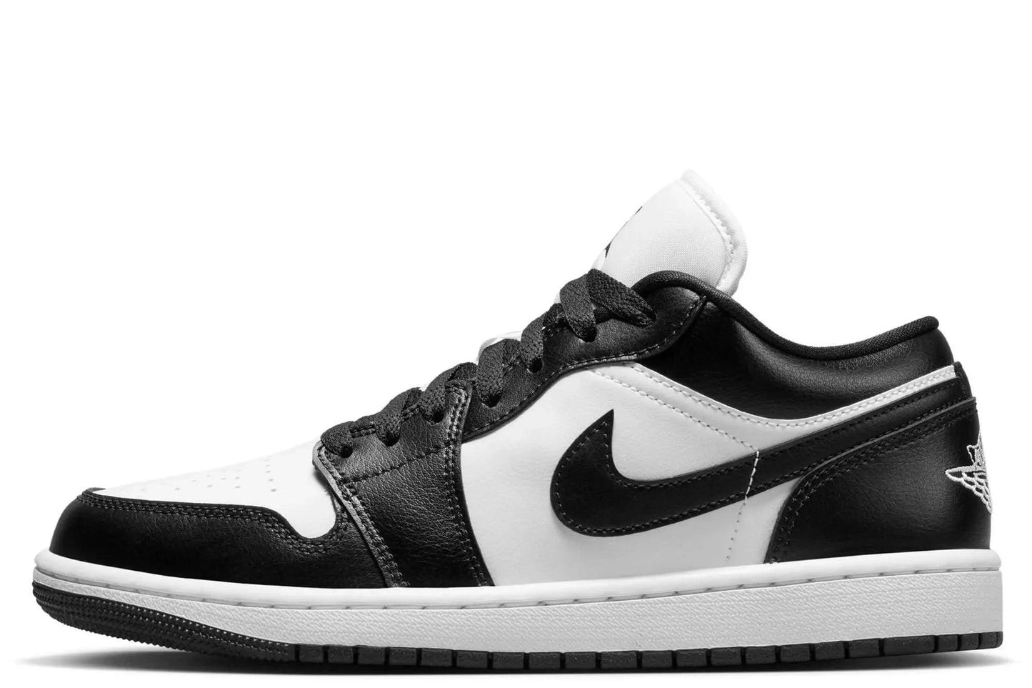 Black and white Nike Air Jordan 1 low sneaker with classic design and iconic swoosh logo