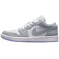 Light gray women's low-top sneaker with white laces and Nike swoosh, stylish casual footwear