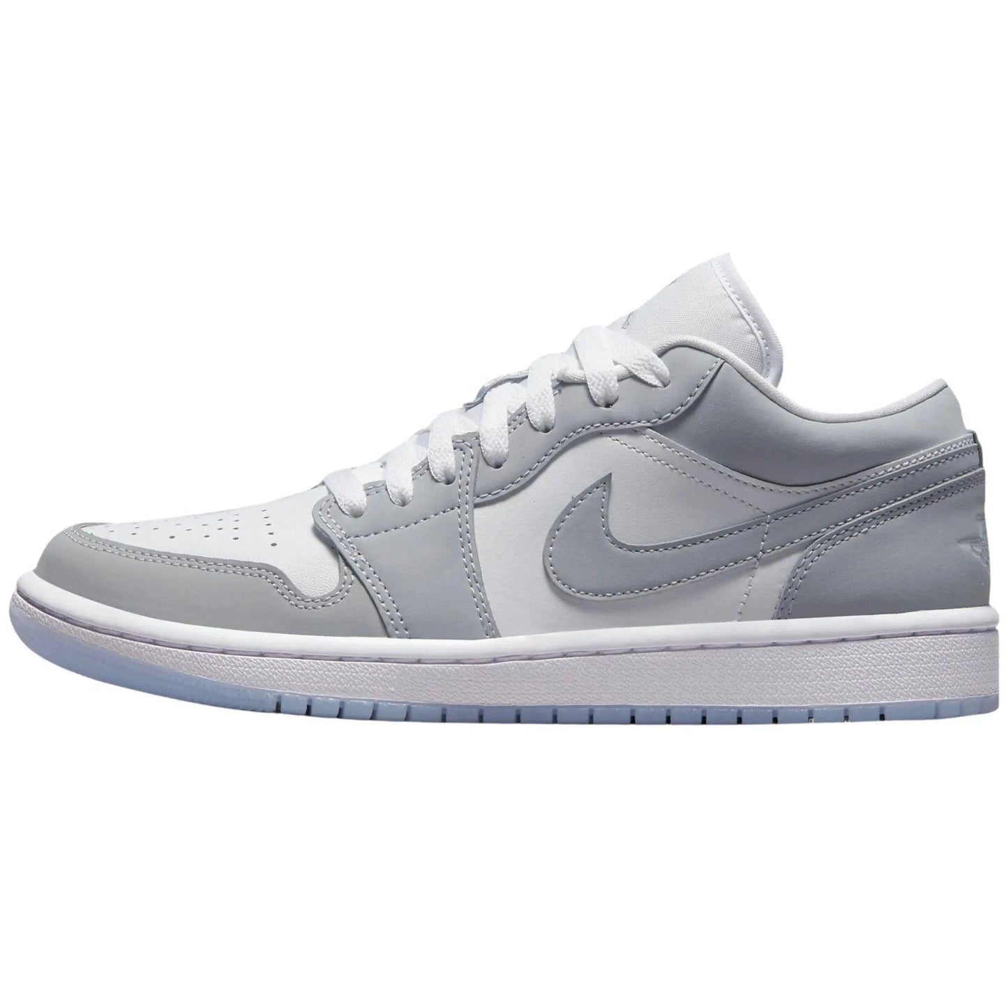 Light gray women's low-top sneaker with white laces and Nike swoosh, stylish casual footwear