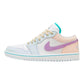 Women's pastel low-top sneaker with purple swoosh, mint accents, and quilted peach panel
