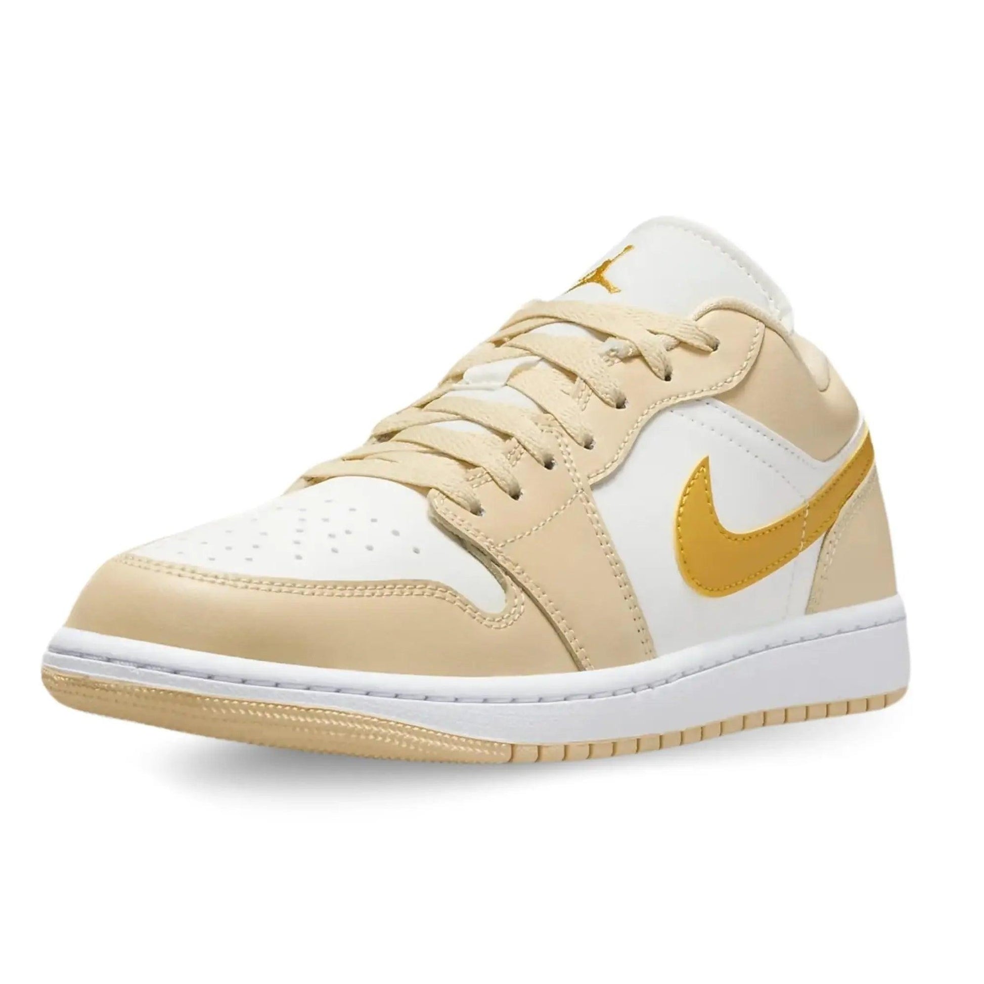 White and gold women's low-top sneaker with Nike swoosh, stylish fashion footwear