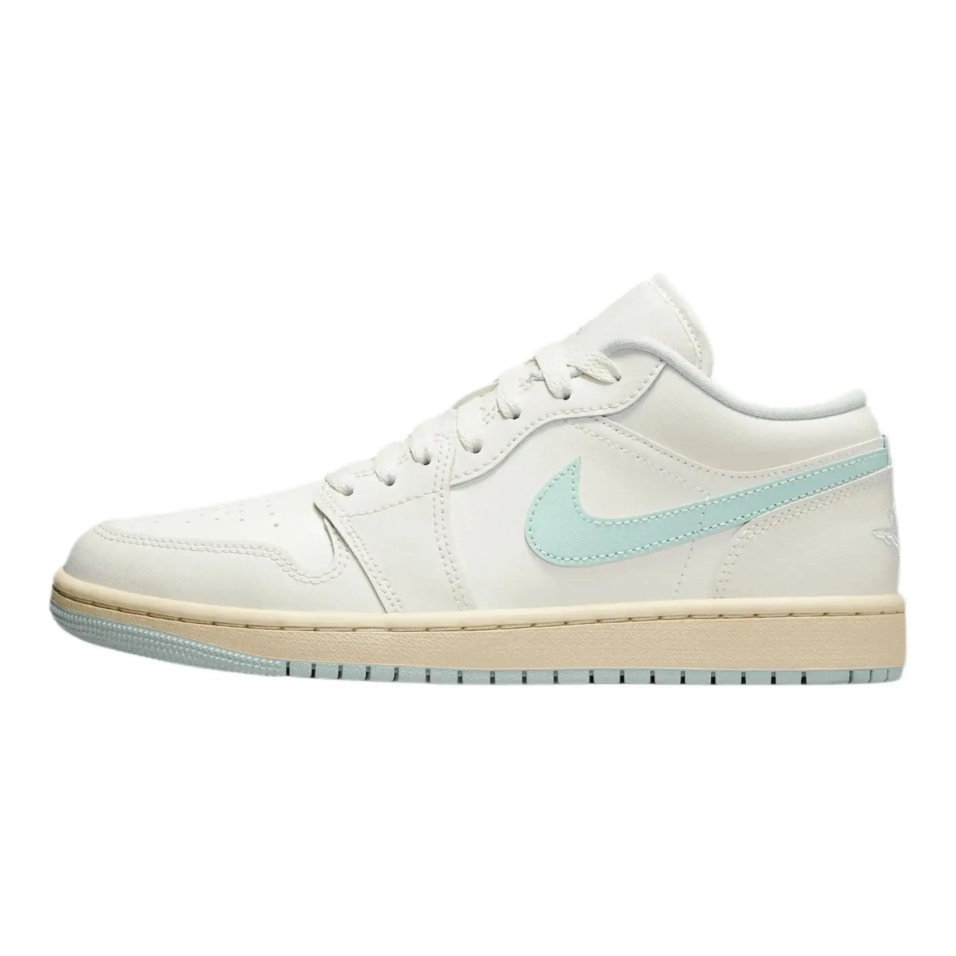 White low-top sneaker with mint green swoosh, perfect for women's fashion and casual style