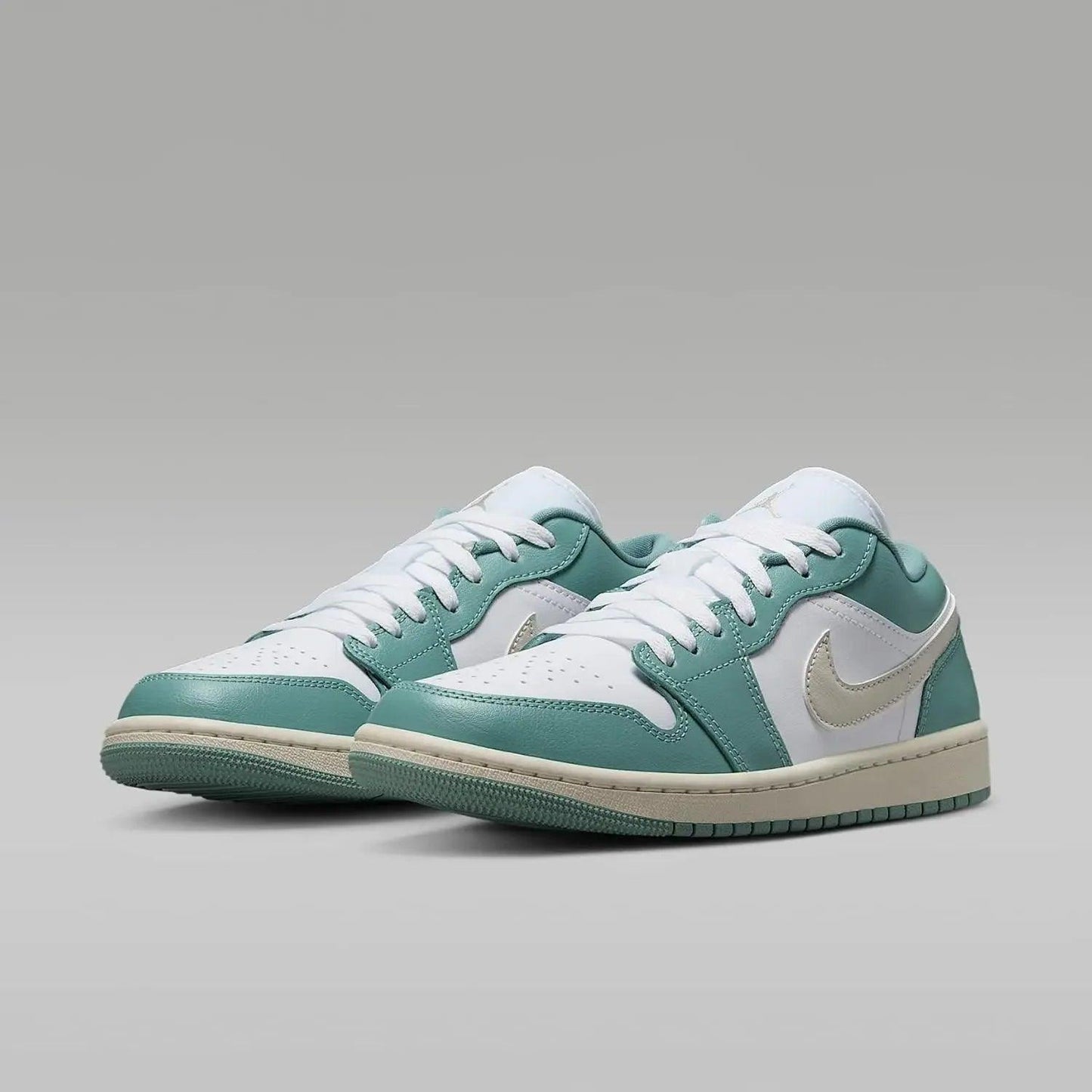 Mint green and white low-top sneakers with Nike swoosh, ideal for women's fashion and casual wear