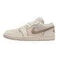 White and gold women's low-top sneaker with glitter Swoosh, perfect for fashion and casual wear