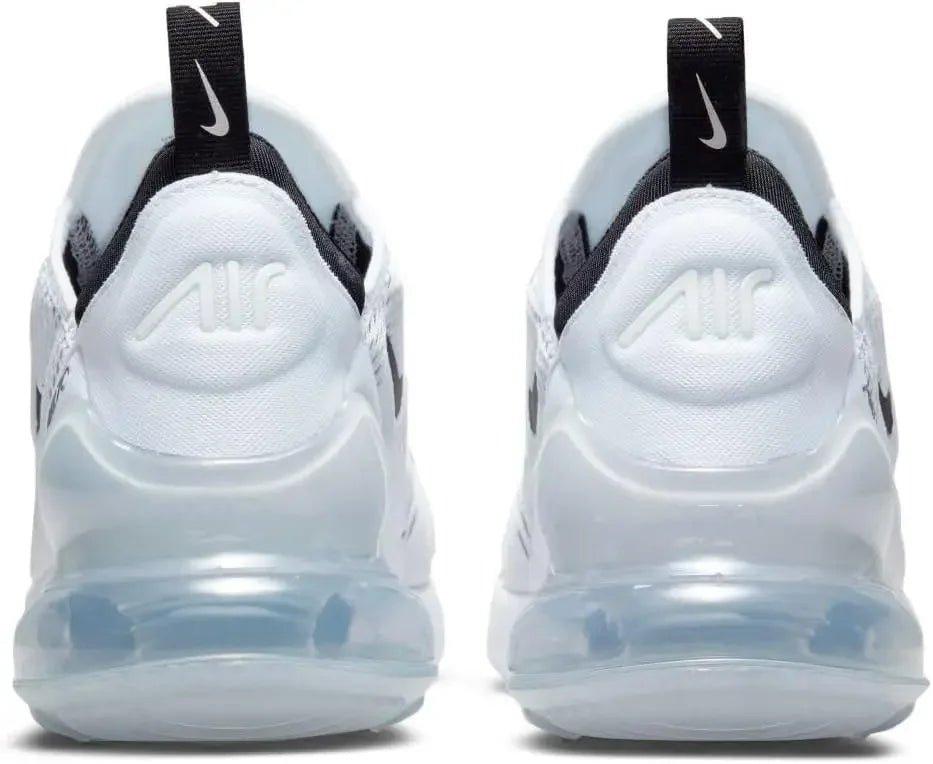 White Nike Air Max 270 sneakers with transparent air cushion sole, black heel tab, and iconic swoosh logo