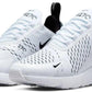 White Nike Air Max 270 sneakers with black swoosh, mesh upper, and visible air cushioning for women's fashion
