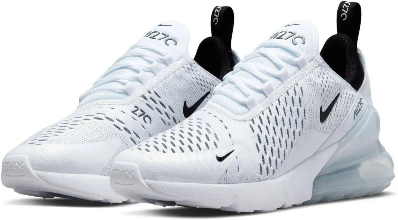 White Nike Air Max 270 sneakers with black swoosh, mesh upper, and visible air cushioning for women's fashion
