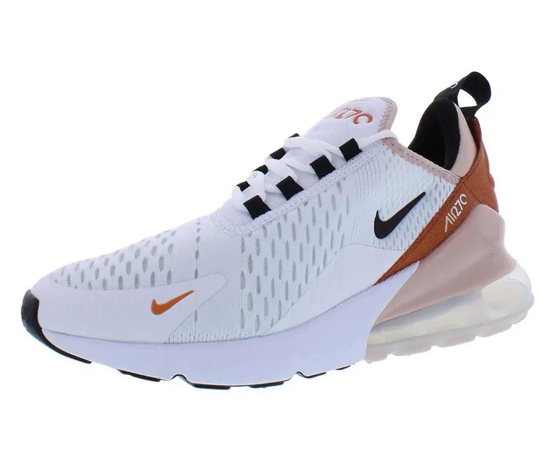 White Nike Air Max 270 women's sneaker with orange accents and breathable mesh design