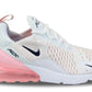 White Nike Air Max 270 women's sneaker with pink air sole, breathable mesh upper, and black swoosh logo