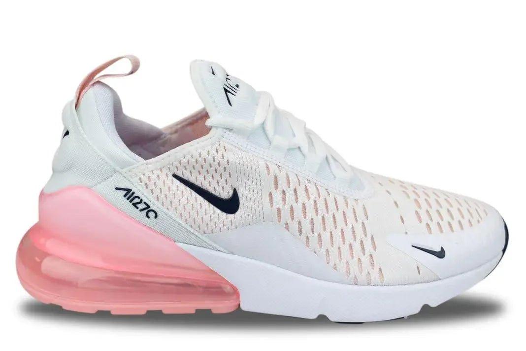 White Nike Air Max 270 women's sneaker with pink air sole, breathable mesh upper, and black swoosh logo