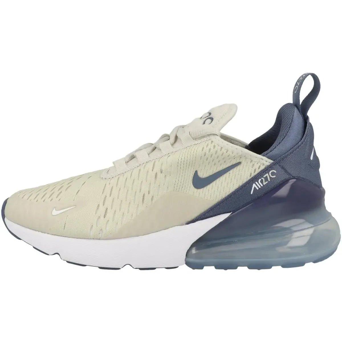 Nike Air Max 270 women's sneaker with beige mesh upper and navy blue accents, featuring visible air cushioning