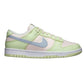 Pastel green and pink women's fashion sneaker with light blue swoosh, white sole, stylish casual shoe