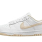 White Nike Dunk Low sneaker with beige Swoosh and gum sole, women's fashion footwear