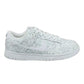 White Nike Dunk Low sneaker with subtle paisley print, women's fashion footwear