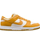Yellow and white Nike Dunk Low sneaker with gum sole, stylish women's fashion footwear