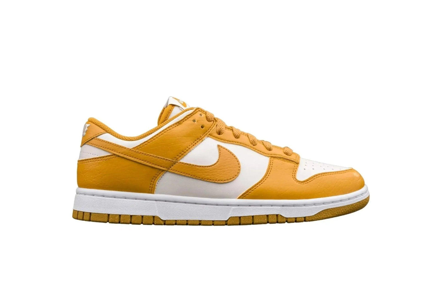 Yellow and white Nike Dunk Low sneaker with gum sole, stylish women's fashion footwear