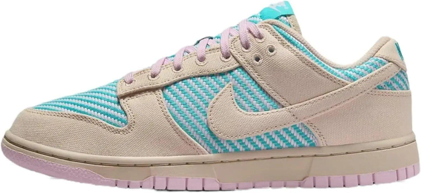 Pastel pink and teal Nike Dunk Low sneaker with striped canvas design, women's fashion footwear