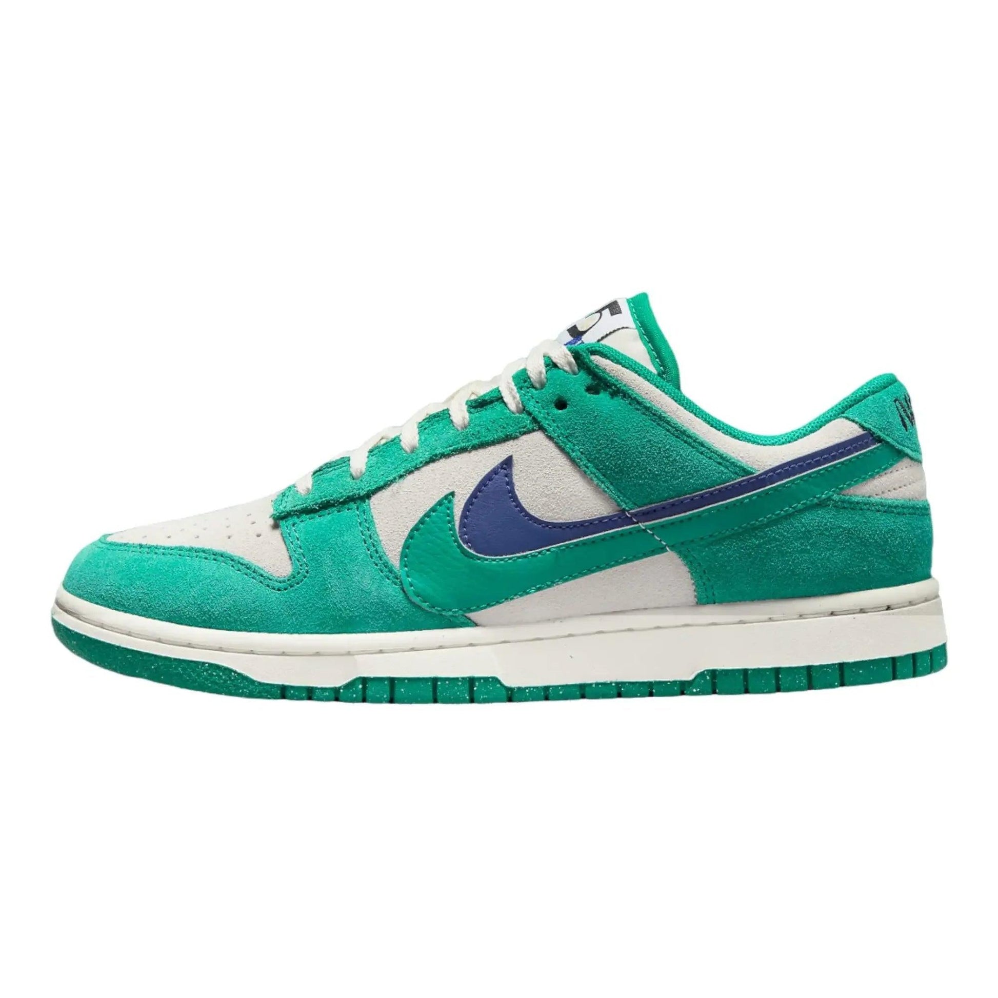 Green and white Nike Dunk Low sneaker with purple Swoosh, women's fashion footwear