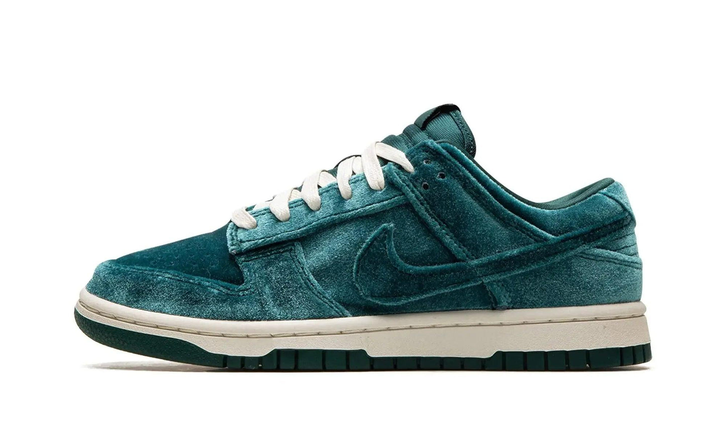 Teal velvet Nike Dunk Low sneaker with white laces and cream sole, stylish women's fashion footwear