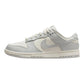 White and light gray women's fashion sneaker with floral Swoosh design, perfect for casual style
