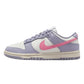 Lavender and pink women's fashion sneaker with iconic swoosh, perfect for casual style and streetwear looks.