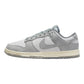 Gray Nike Dunk Low sneaker with white sole, perfect for women's fashion and casual wear