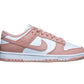 Pink and white Nike Dunk Low sneaker for women's fashion