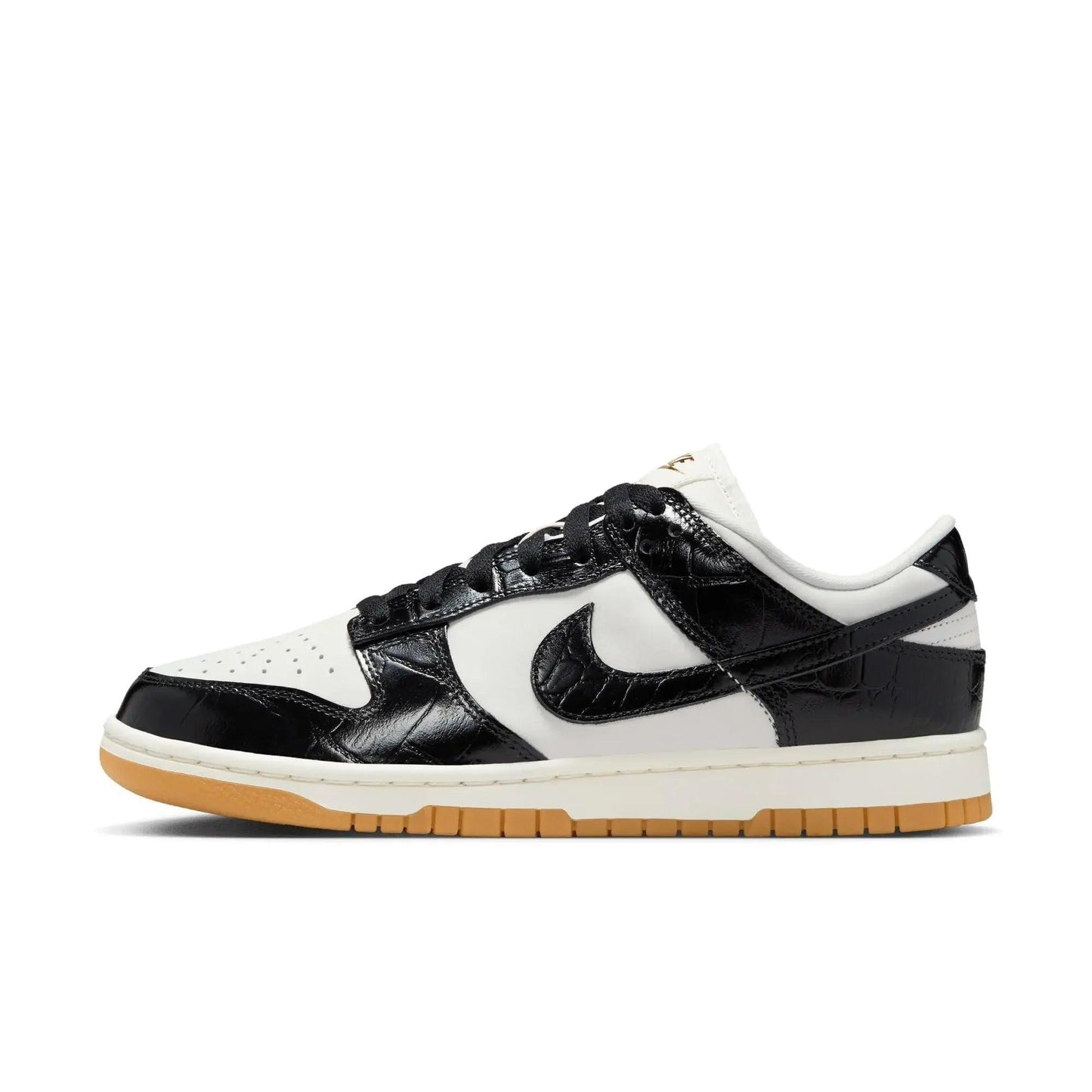 Black and white women's fashion sneaker with croc-textured leather and gum sole