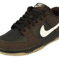 Brown Nike Dunk Low sneaker with white swoosh, black laces, and gum sole for casual fashion