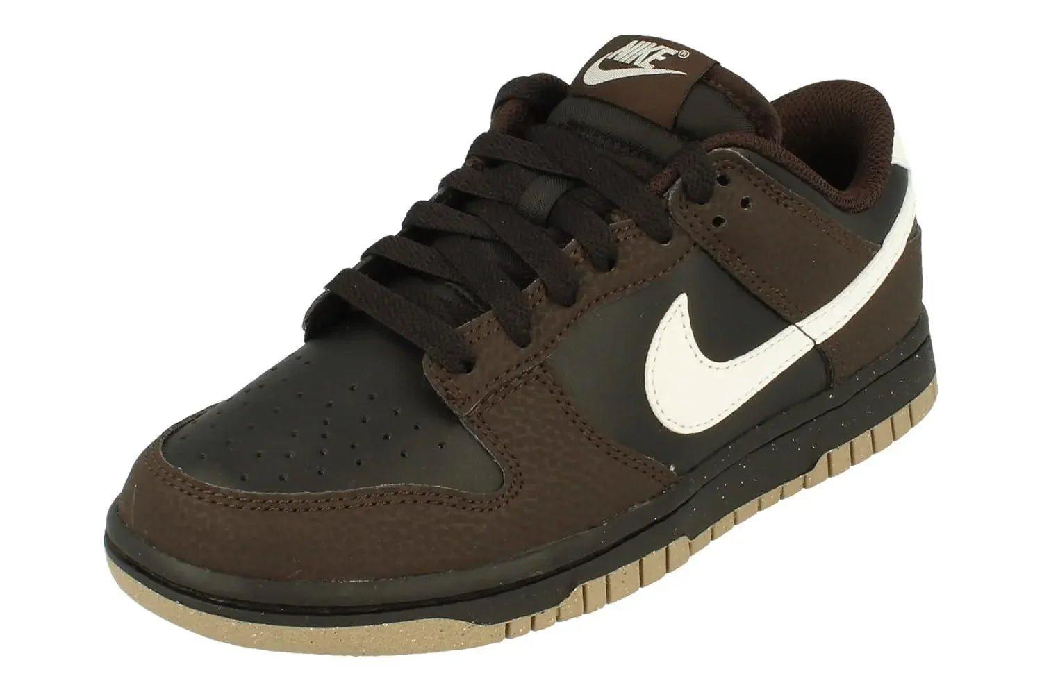 Brown Nike Dunk Low sneaker with white swoosh, black laces, and gum sole for casual fashion