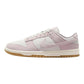 Pink and white Nike Dunk Low sneaker with gum sole, women's fashion footwear