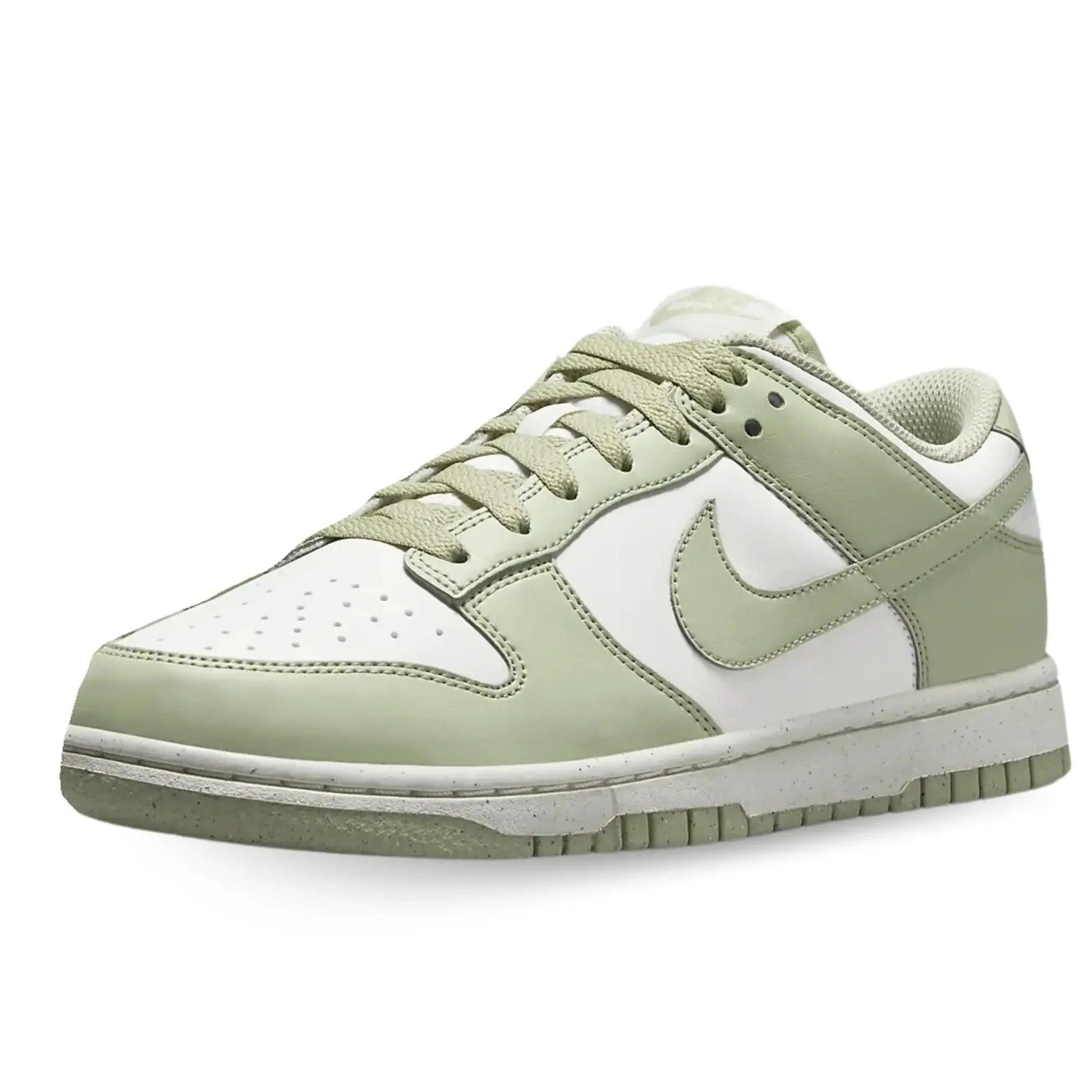 Pale green and white low-top sneaker with Nike swoosh, ideal for women's fashion and casual wear.