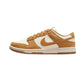 Tan and white Nike Dunk Low sneaker with suede texture and gum sole, women's fashion footwear