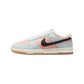 Pastel pink and blue Nike Dunk sneaker with black swoosh and gum sole